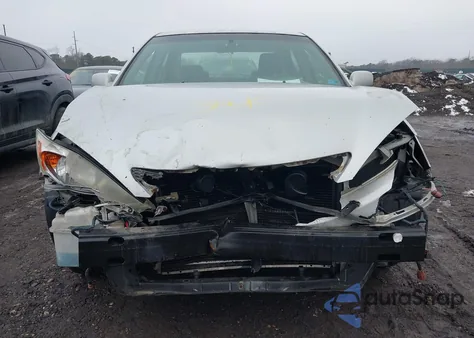 2003 Toyota Camry Le z USA, uszkodzony, nr VIN 4T1BE32K73U140341